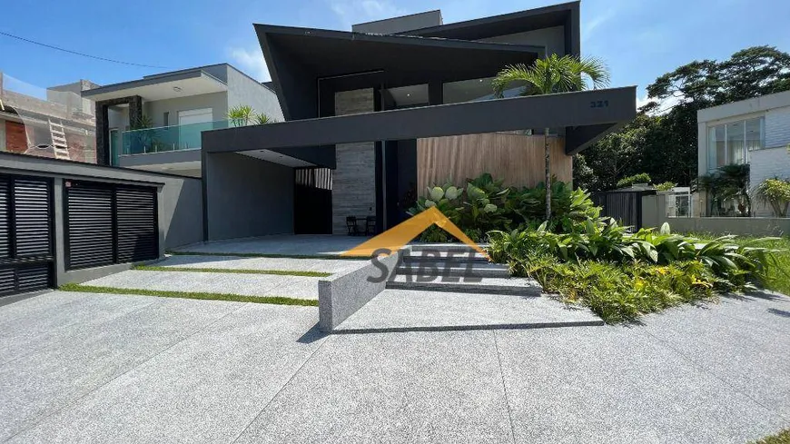 Foto 1 de Casa de Condomínio com 5 Quartos à venda, 307m² em Riviera de São Lourenço, Bertioga