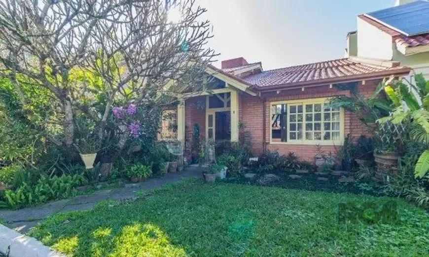 Foto 1 de Casa de Condomínio com 4 Quartos à venda, 211m² em Lomba do Pinheiro, Porto Alegre