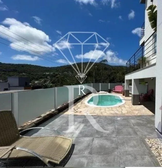 Foto 1 de Sobrado com 3 Quartos à venda, 176m² em Itacorubi, Florianópolis