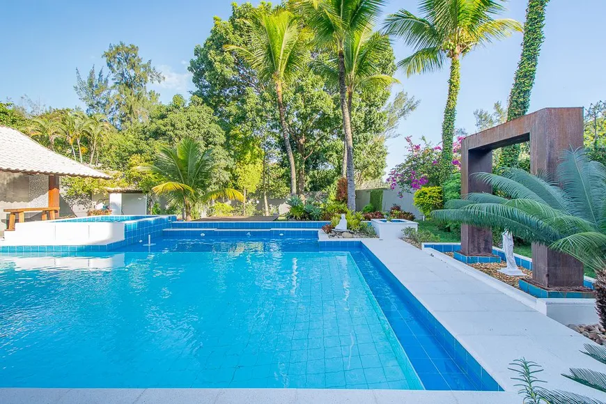 Foto 1 de Casa de Condomínio com 4 Quartos à venda, 668m² em Barra da Tijuca, Rio de Janeiro