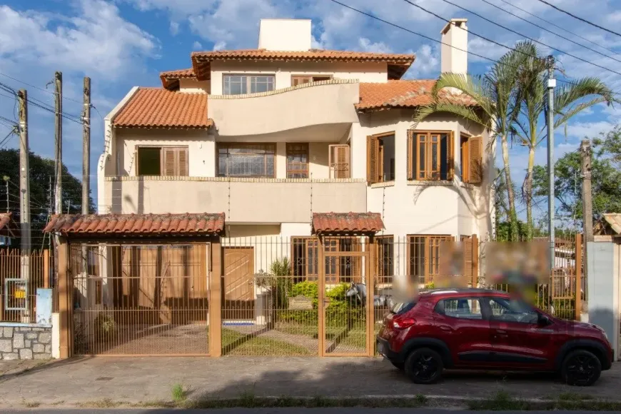 Foto 1 de Casa com 4 Quartos à venda, 256m² em Ipanema, Porto Alegre