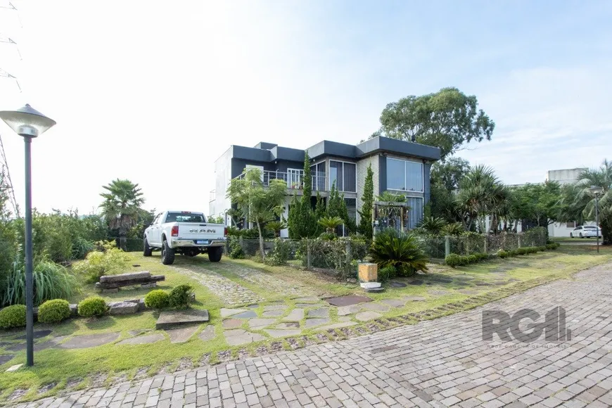 Foto 1 de Casa de Condomínio com 4 Quartos à venda, 400m² em Teresópolis, Porto Alegre