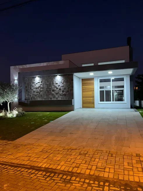 Foto 1 de Casa de Condomínio com 4 Quartos à venda, 170m² em Condominio Dubai Resort, Capão da Canoa