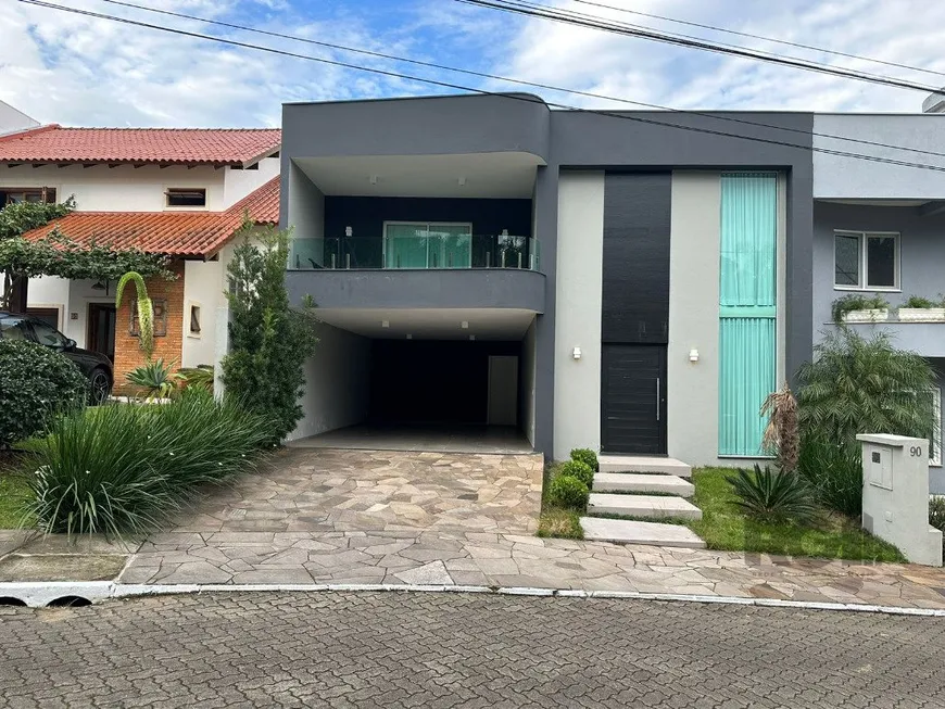 Foto 1 de Casa de Condomínio com 3 Quartos à venda, 361m² em Hípica, Porto Alegre