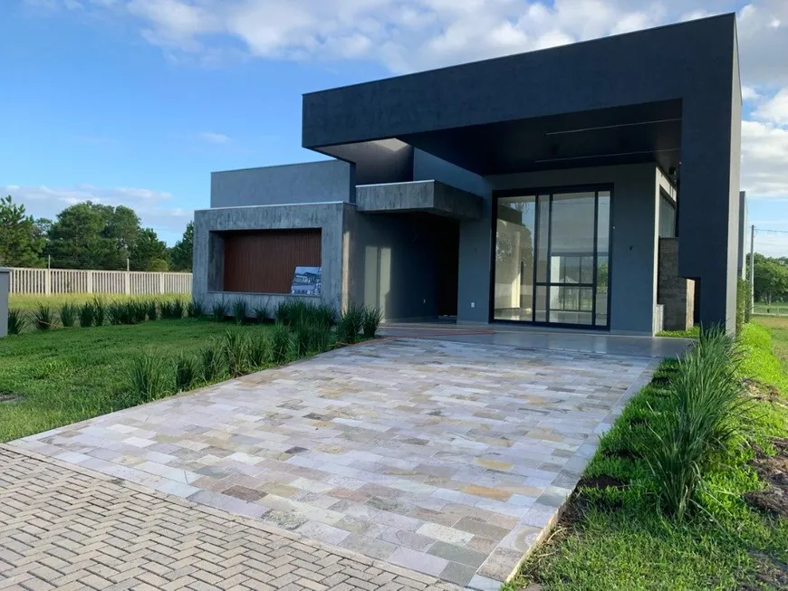 Foto 1 de Casa de Condomínio com 4 Quartos à venda, 194m² em Arroio Teixeira, Capão da Canoa