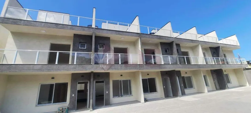 Foto 1 de Casa de Condomínio com 2 Quartos à venda, 84m² em Centro, Caraguatatuba