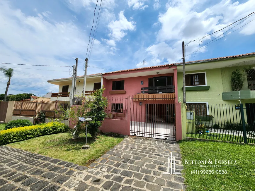 Foto 1 de Sobrado com 3 Quartos à venda, 131m² em Bacacheri, Curitiba