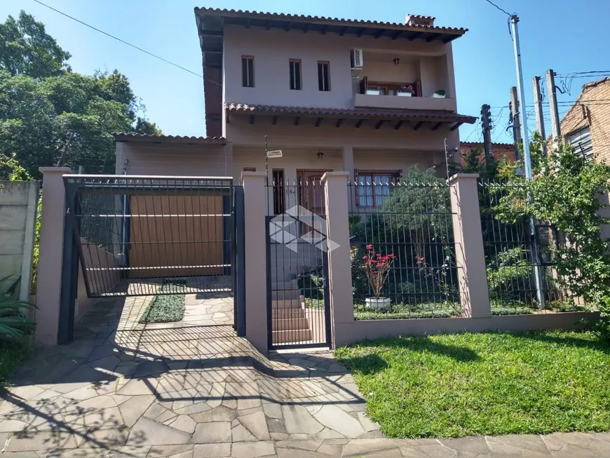 Foto 1 de Casa com 4 Quartos à venda, 174m² em Cristal, Porto Alegre