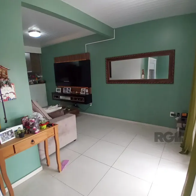 Foto 1 de Casa com 4 Quartos à venda, 96m² em Hípica, Porto Alegre