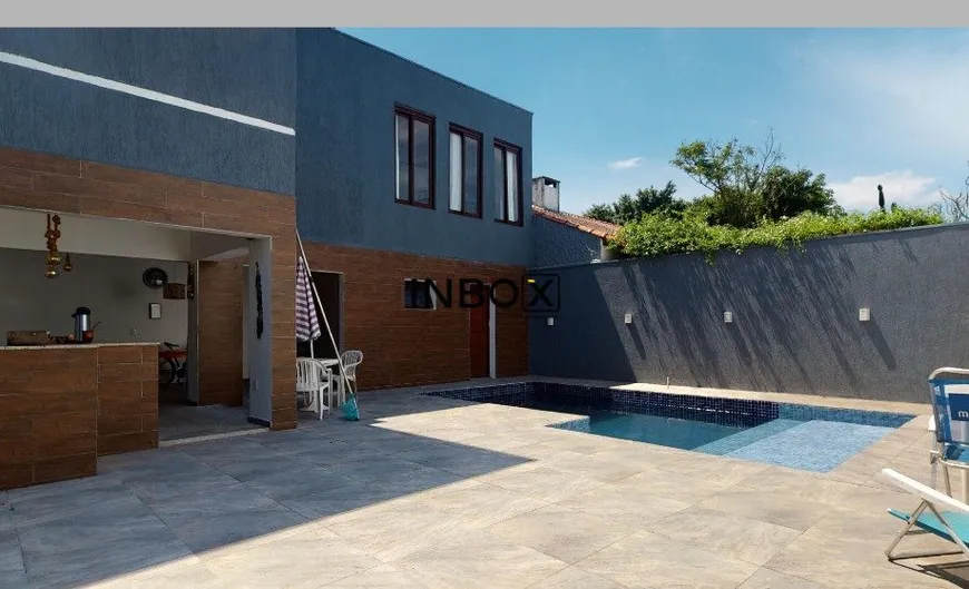 Foto 1 de Casa com 4 Quartos à venda, 400m² em Guarujá, Porto Alegre