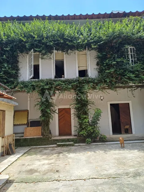 Foto 1 de Casa com 8 Quartos para venda ou aluguel, 300m² em Laranjeiras, Rio de Janeiro