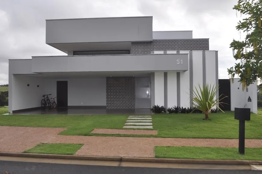 Foto 1 de Casa de Condomínio com 3 Quartos à venda, 230m² em Alphaville, Uberlândia