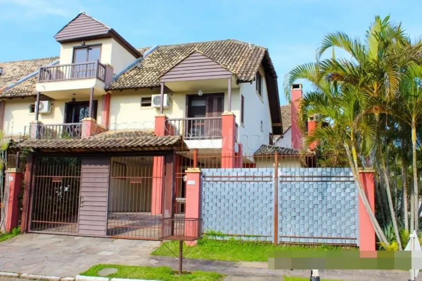 Foto 1 de Sobrado com 3 Quartos à venda, 267m² em Ipanema, Porto Alegre