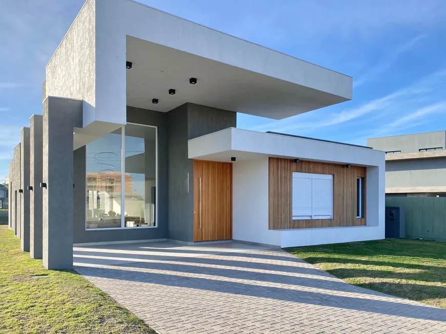 Foto 1 de Casa de Condomínio com 4 Quartos à venda, 248m² em Condominio Costa Serena, Capão da Canoa