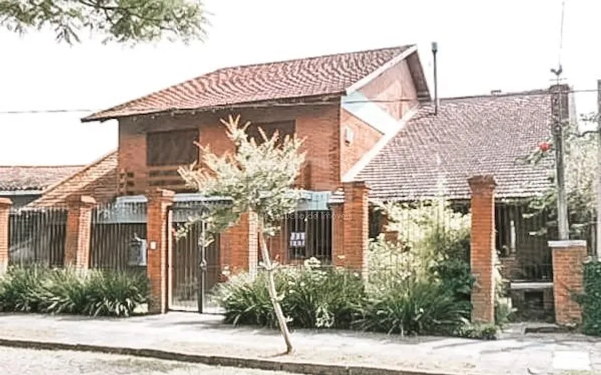 Foto 1 de Casa com 4 Quartos à venda, 403m² em Vila Assunção, Porto Alegre