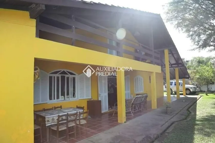 Foto 1 de Casa com 5 Quartos à venda, 260m² em Praia da Barra, Garopaba