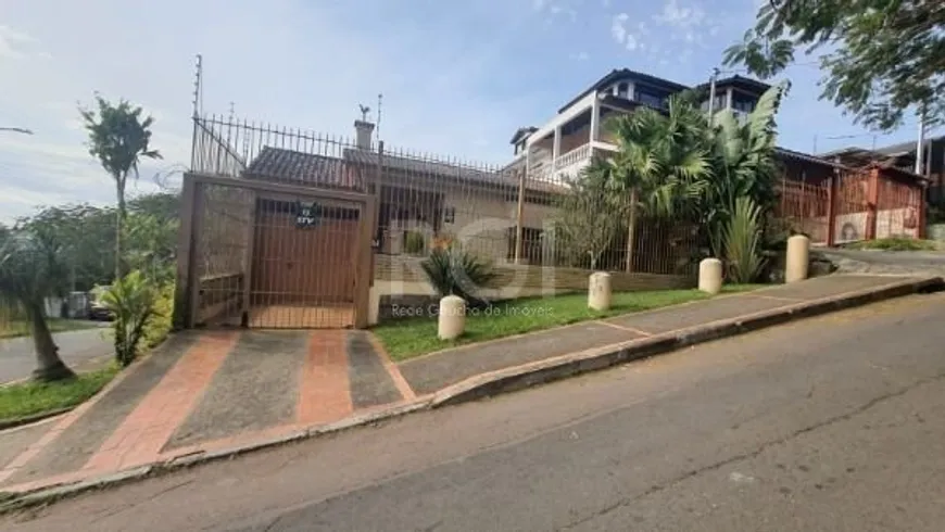 Foto 1 de Casa com 4 Quartos à venda, 228m² em Tristeza, Porto Alegre