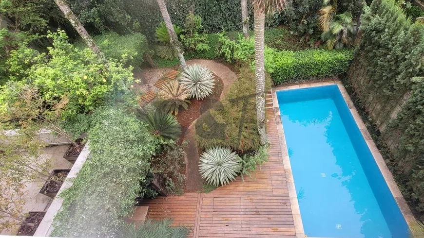 Foto 1 de Casa com 4 Quartos à venda, 400m² em Jardim Petrópolis, São Paulo
