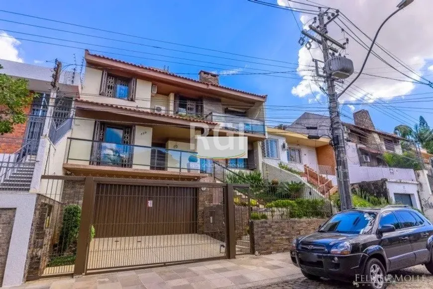 Foto 1 de Casa de Condomínio com 3 Quartos à venda, 261m² em Medianeira, Porto Alegre