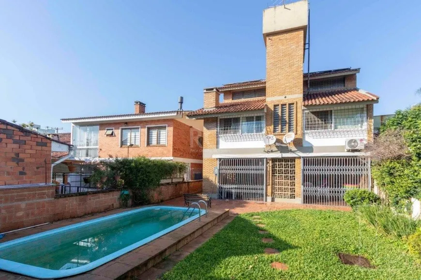 Foto 1 de Casa com 4 Quartos à venda, 348m² em Tristeza, Porto Alegre