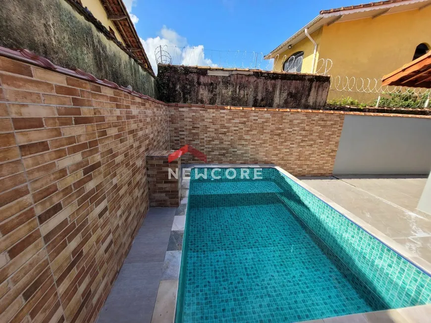 Foto 1 de Casa com 2 Quartos à venda, 80m² em Vila Oceanopolis, Mongaguá