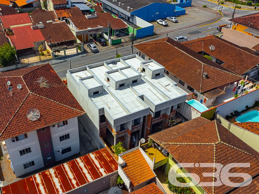 Foto 1 de Sobrado com 3 Quartos à venda, 111m² em Iririú, Joinville