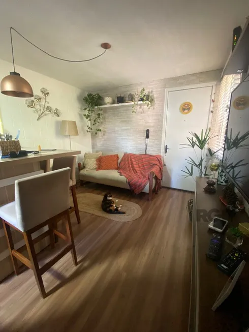 Foto 1 de Apartamento com 2 Quartos à venda, 37m² em Vila Nova, Porto Alegre