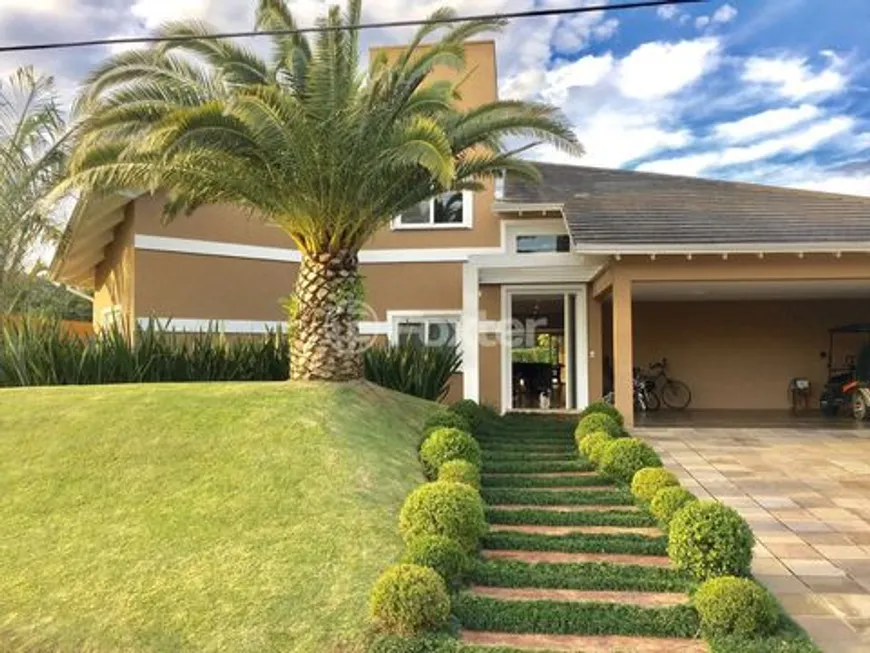 Foto 1 de Casa com 4 Quartos à venda, 414m² em Chapéu do Sol, Porto Alegre