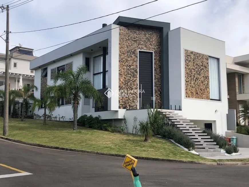 Foto 1 de Casa de Condomínio com 3 Quartos à venda, 378m² em São Vicente, Gravataí