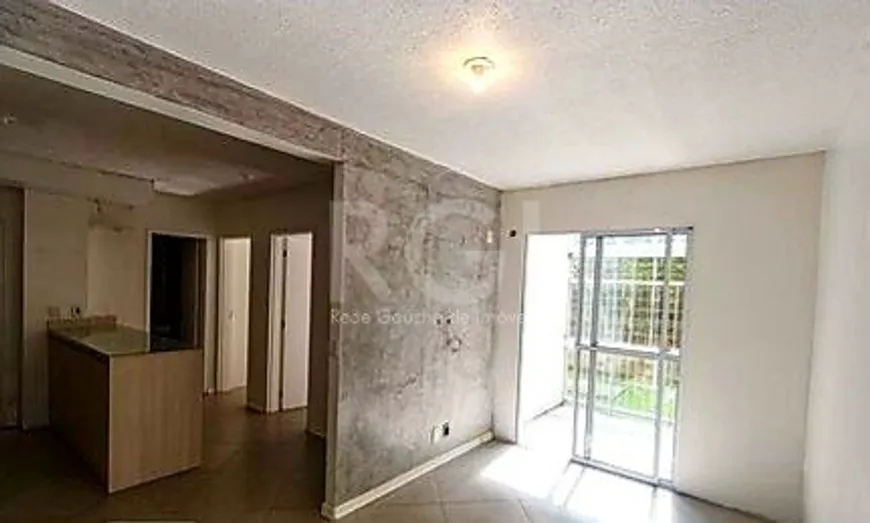 Foto 1 de Apartamento com 2 Quartos à venda, 49m² em Vila Nova, Porto Alegre