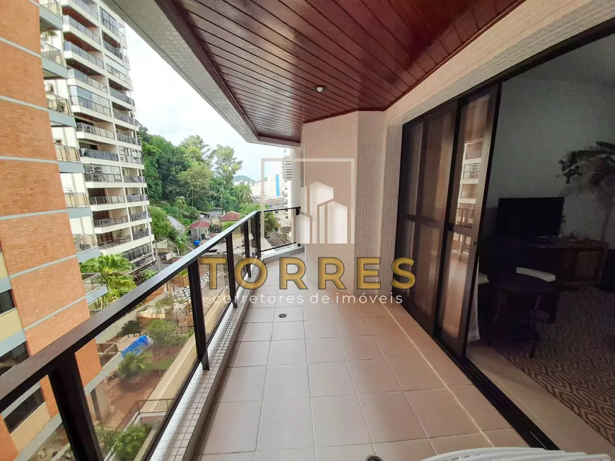 Foto 1 de Apartamento com 3 Quartos à venda, 105m² em Praia das Pitangueiras, Guarujá