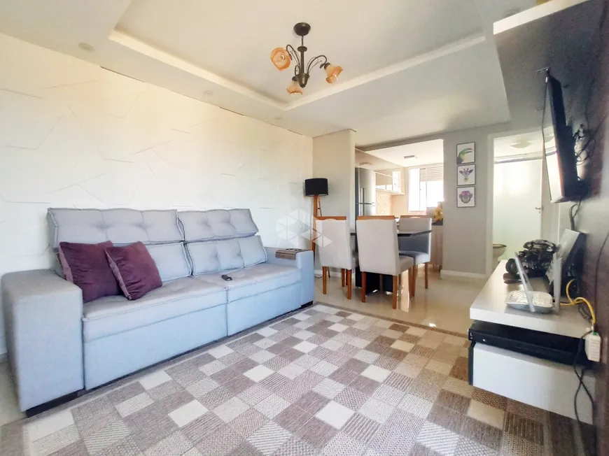 Foto 1 de Apartamento com 2 Quartos à venda, 47m² em Vila Nova, Porto Alegre