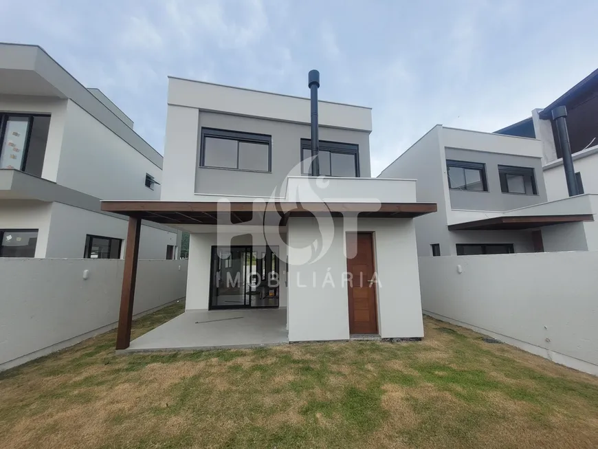 Foto 1 de Casa com 4 Quartos à venda, 185m² em Rio Tavares, Florianópolis