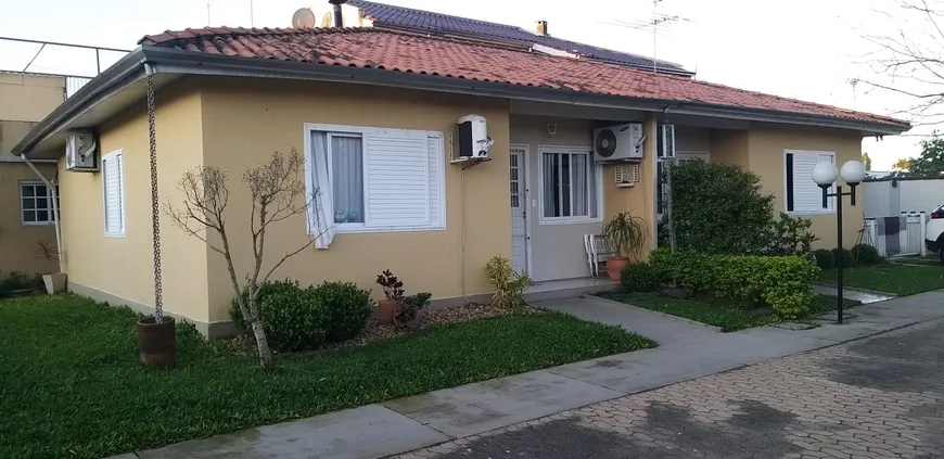 Foto 1 de Casa de Condomínio com 3 Quartos à venda, 126m² em Tamandare, Esteio