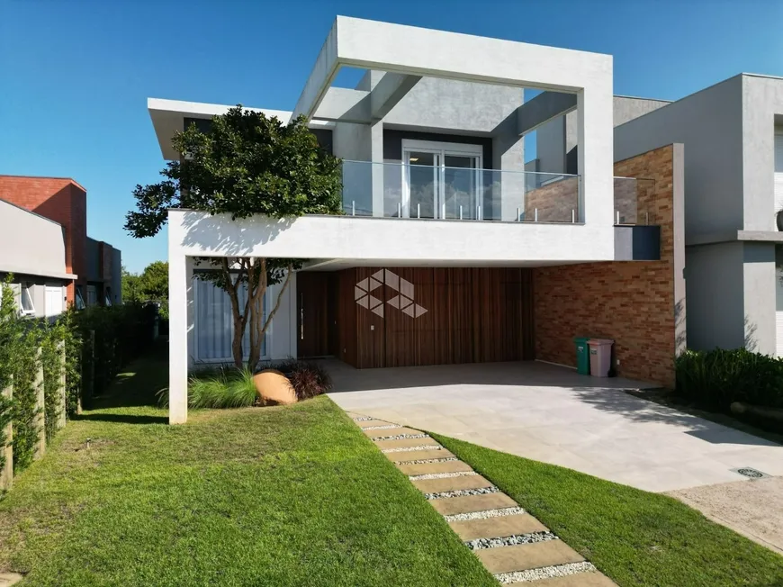 Foto 1 de Casa de Condomínio com 4 Quartos à venda, 229m² em Condominio Capao Ilhas Resort, Capão da Canoa
