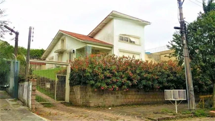 Foto 1 de Casa com 3 Quartos à venda, 584m² em Três Figueiras, Porto Alegre
