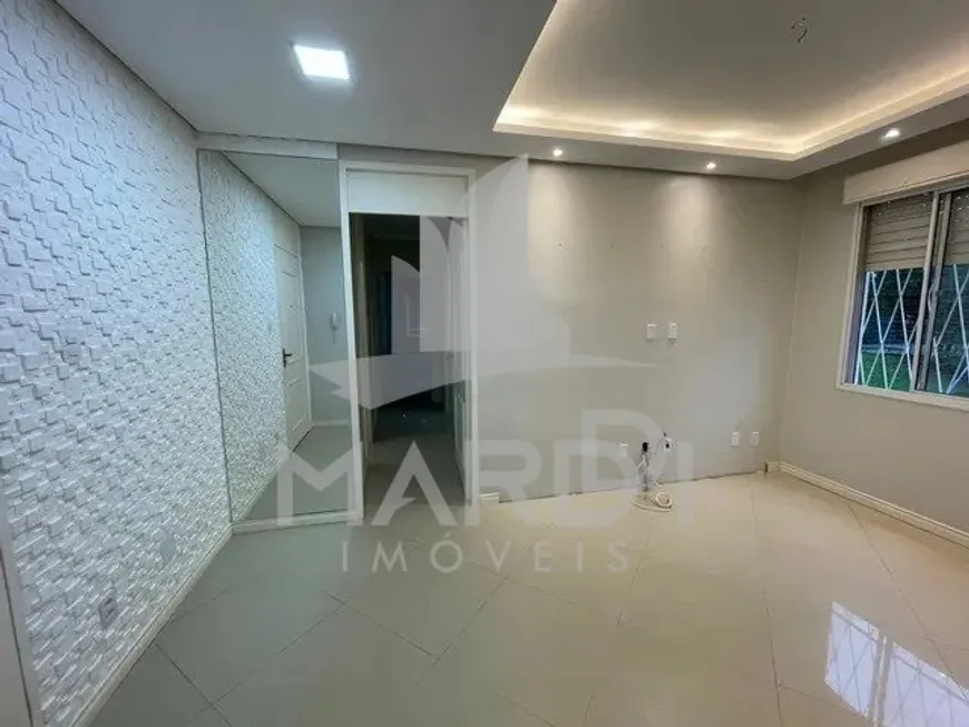 Foto 1 de Apartamento com 3 Quartos à venda, 63m² em Vila Nova, Porto Alegre