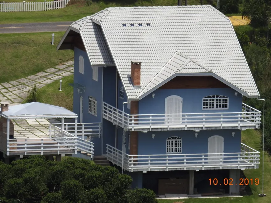 Foto 1 de Casa de Condomínio com 5 Quartos à venda, 224m² em Alpes Campos do Jordao, Campos do Jordão