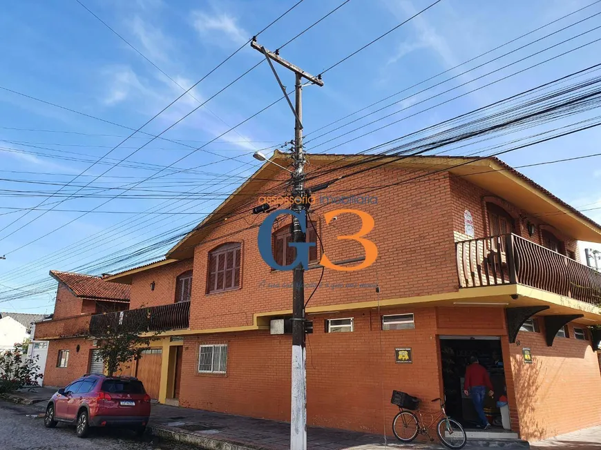 Foto 1 de Casa com 3 Quartos à venda, 169m² em Centro, Pelotas