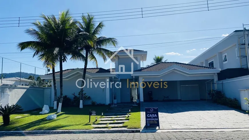 Foto 1 de Casa de Condomínio com 7 Quartos para venda ou aluguel, 630m² em Jardim Acapulco , Guarujá