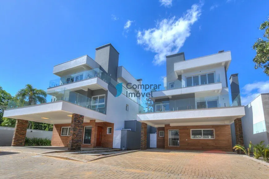 Foto 1 de Casa de Condomínio com 3 Quartos à venda, 300m² em Pedra Redonda, Porto Alegre