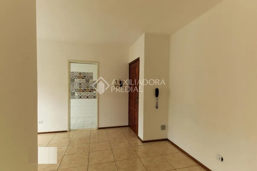 Foto 1 de Apartamento com 2 Quartos à venda, 52m² em Vila Nova, Porto Alegre