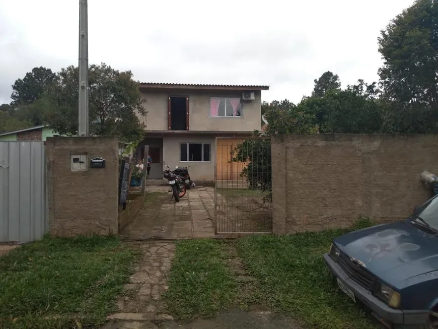 Foto 1 de Sobrado com 3 Quartos à venda, 91m² em Tarumã, Viamão