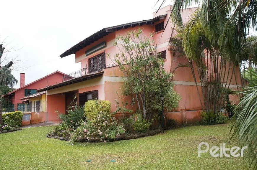 Foto 1 de Casa com 5 Quartos à venda, 295m² em Ipanema, Porto Alegre