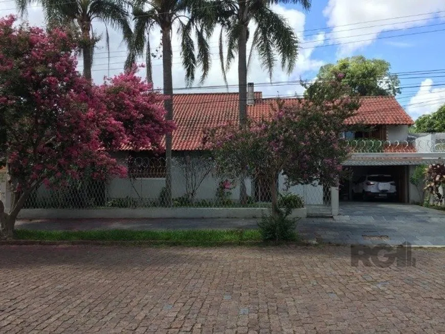 Foto 1 de Casa com 4 Quartos à venda, 285m² em Teresópolis, Porto Alegre