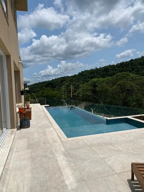 Foto 1 de Casa com 5 Quartos para venda ou aluguel, 680m² em Alphaville, Santana de Parnaíba