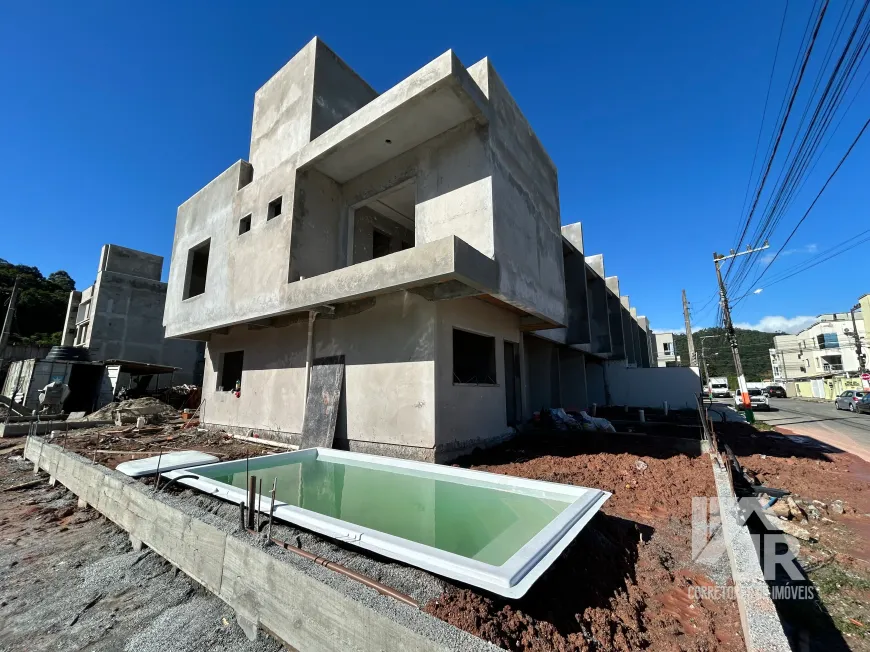 Foto 1 de Sobrado com 2 Quartos à venda, 74m² em Rio Pequeno, Camboriú