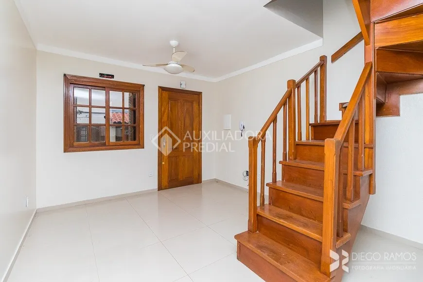 Foto 1 de Casa de Condomínio com 2 Quartos à venda, 58m² em Camaquã, Porto Alegre