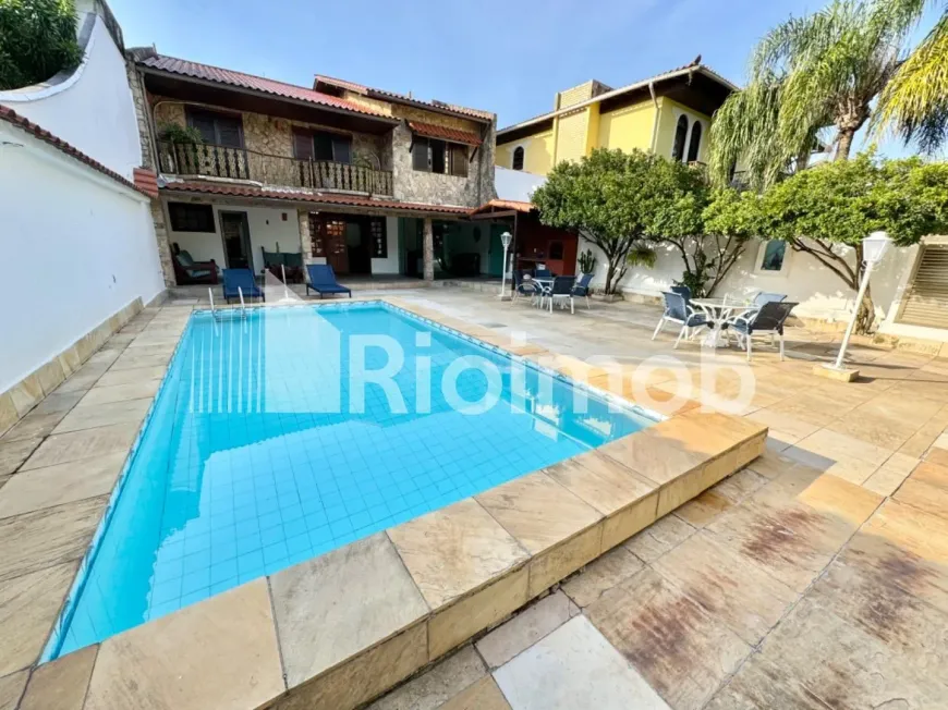 Foto 1 de Casa de Condomínio com 4 Quartos à venda, 400m² em Barra da Tijuca, Rio de Janeiro