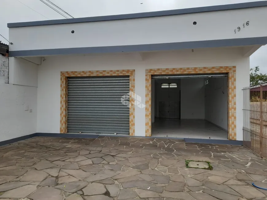 Foto 1 de Sobrado com 5 Quartos à venda, 250m² em Vila Nova, Porto Alegre